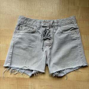 Le Lis Blanc Lace-Up Distressed Denim Shorts